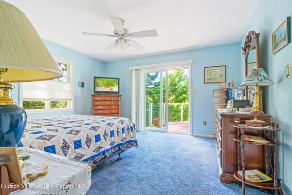 a bathroom with a glass shower door