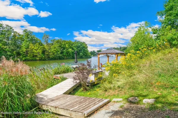 a view of a garden with a lake