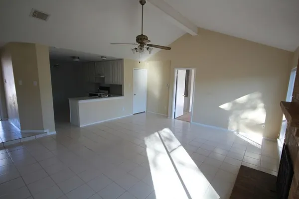 a view of a livingroom with a staircase