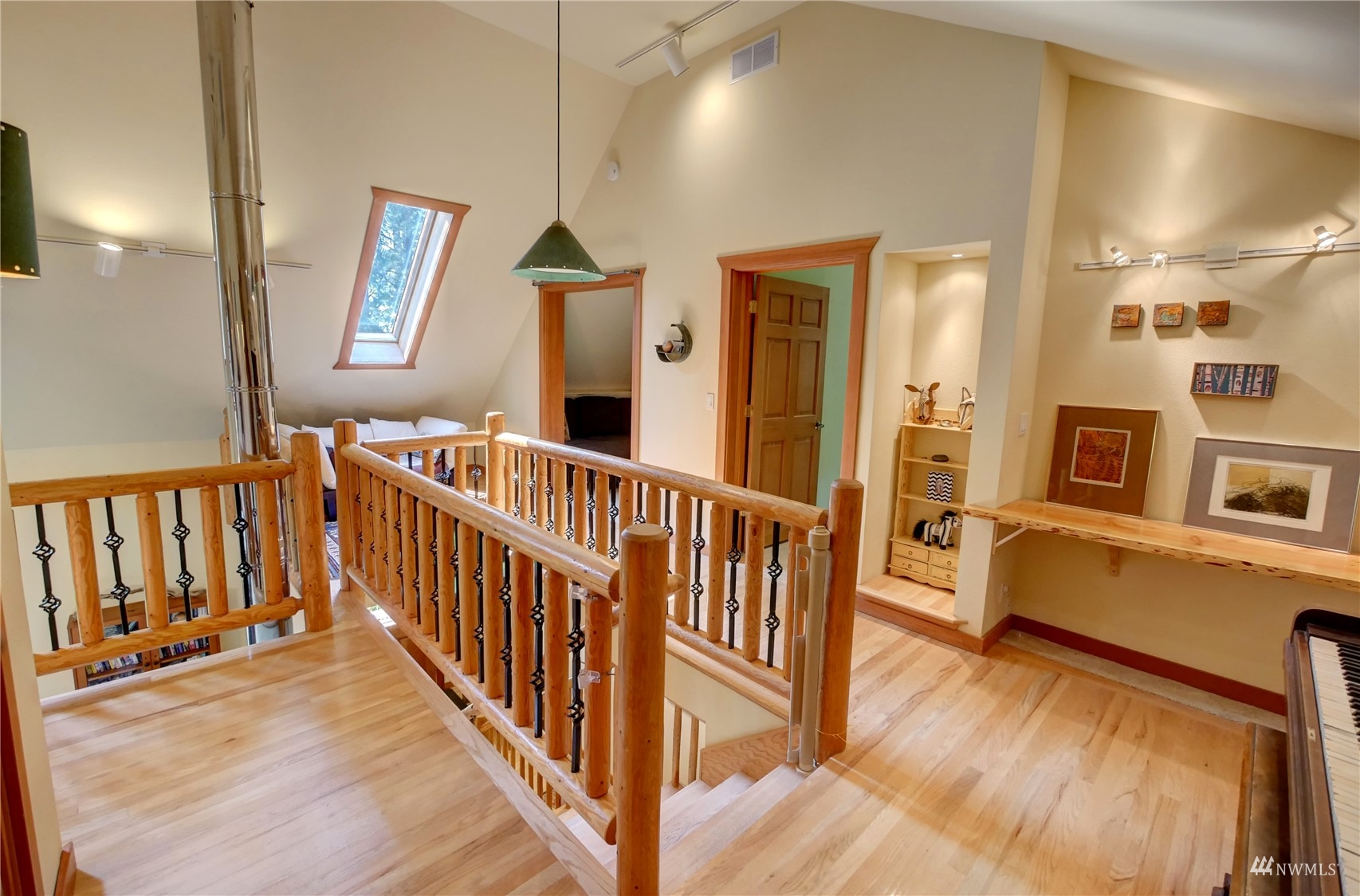 12 Bitterbrush Road Winthrop, WA 98862 - Photo 18 of 39 a view of a hallway with wooden floor and windows