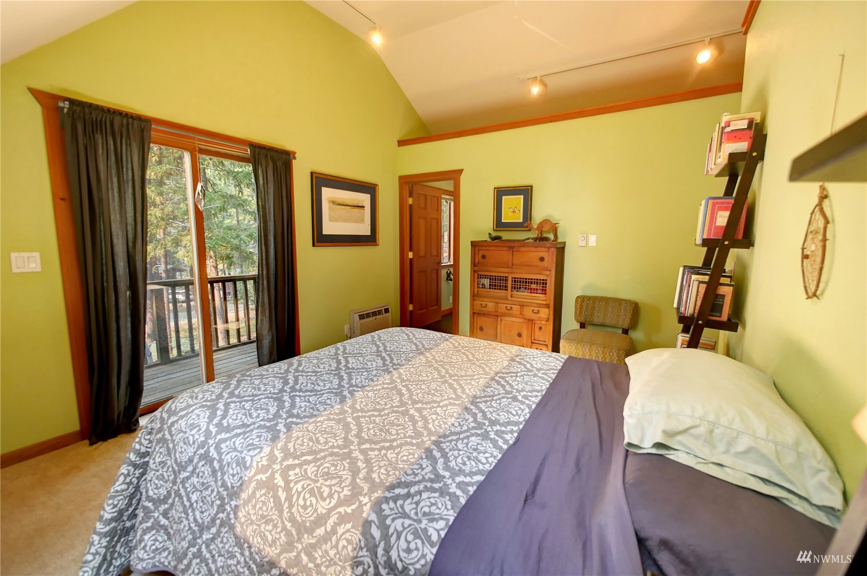 12 Bitterbrush Road Winthrop, WA 98862 - Photo 20 of 39 a bedroom with a bed dresser and a large window