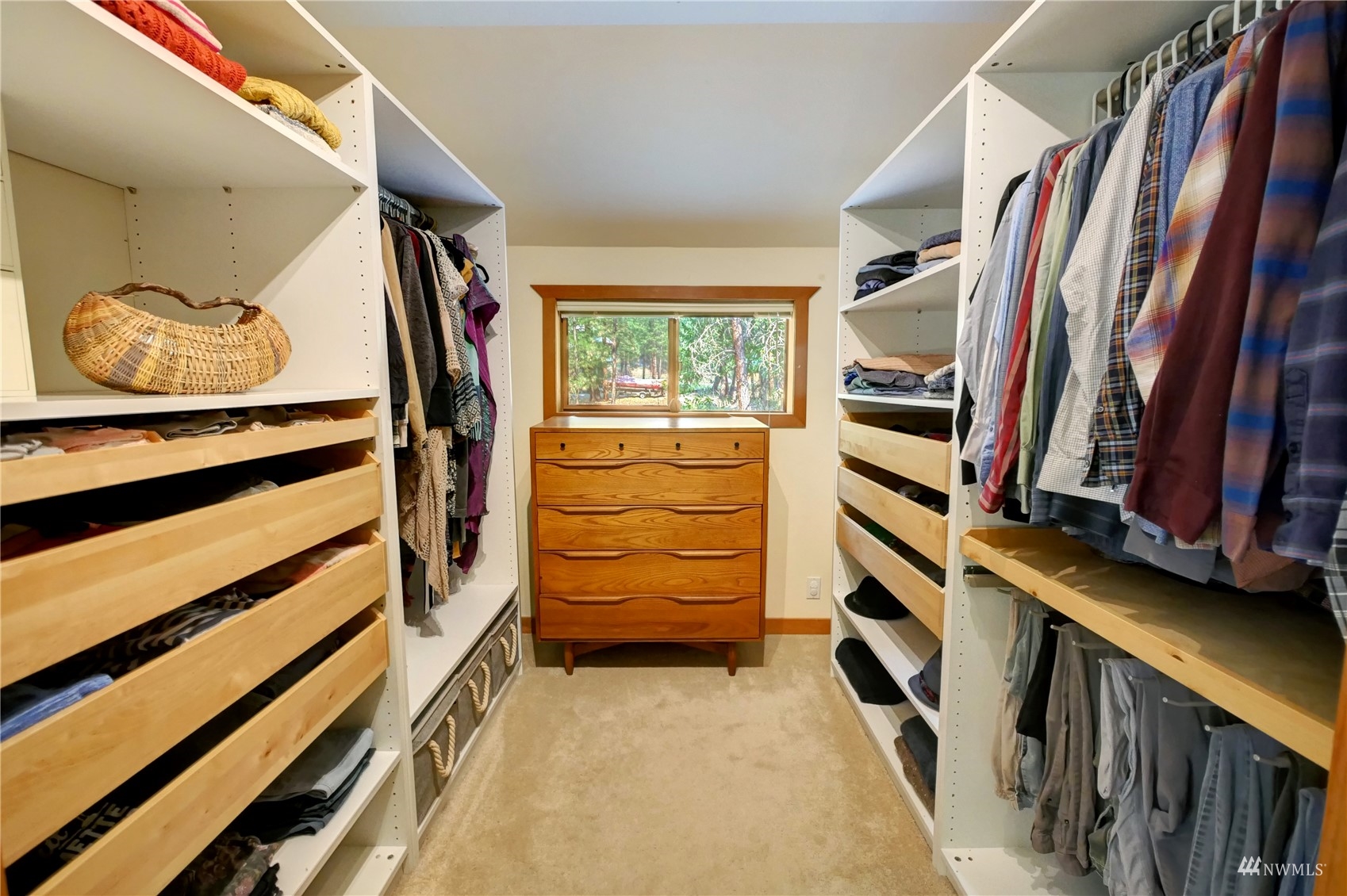 12 Bitterbrush Road Winthrop, WA 98862 - Photo 23 of 39 a view of walk in closet with clothes and shoes