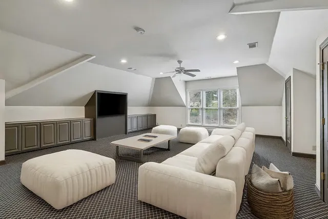 a view of a livingroom with furniture and chandelier