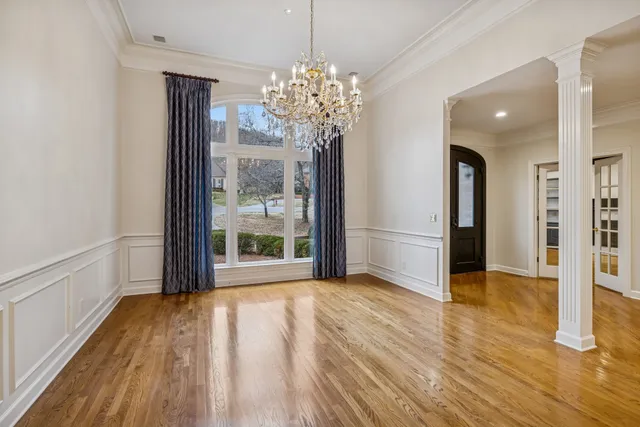 a view of entryway with wooden floor