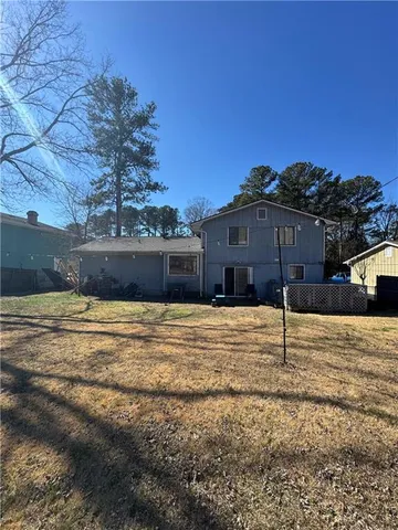 a house view with a outdoor space