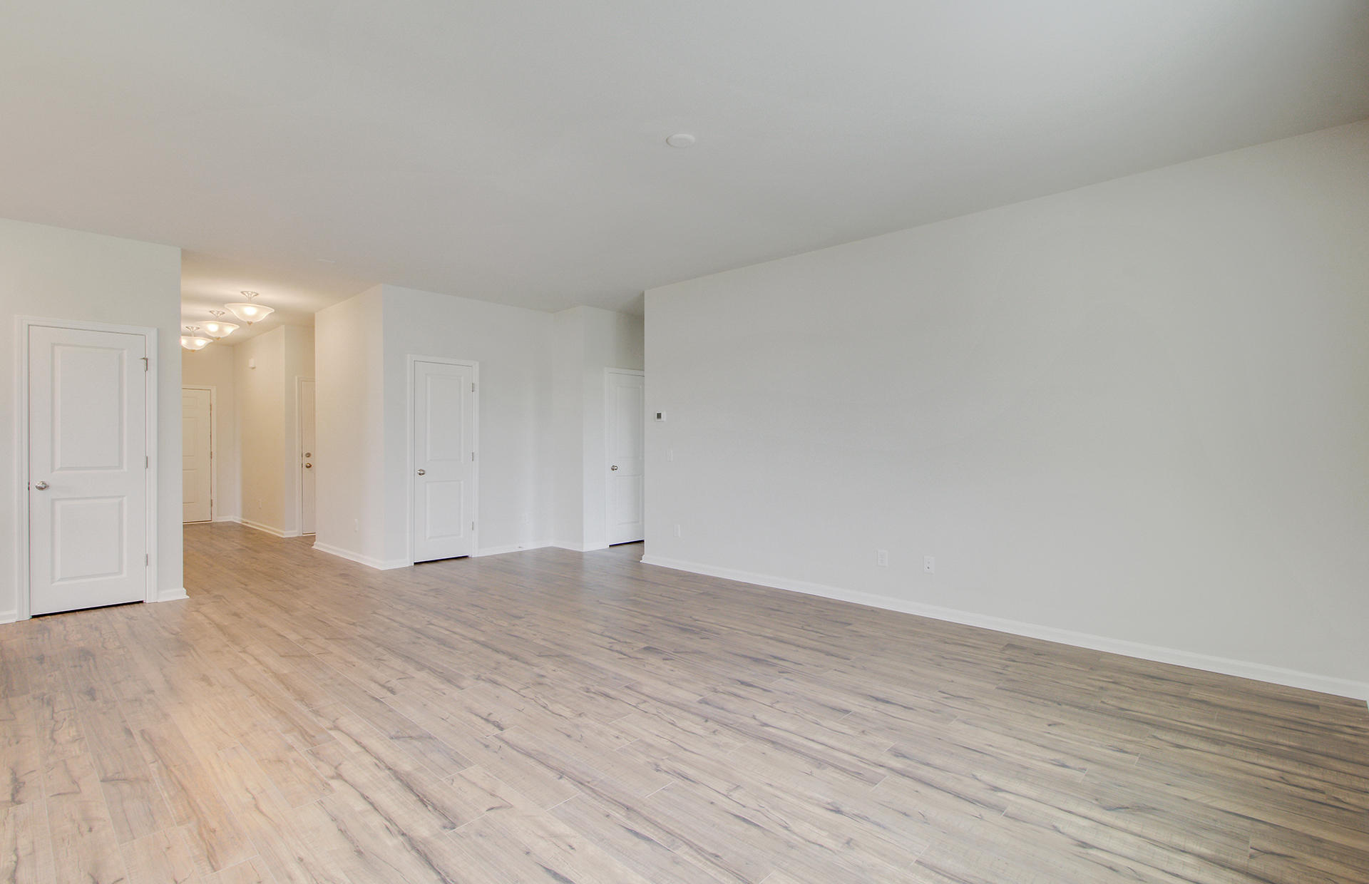165 Hayworth Road Summerville, SC 29486 - Photo 7 of 33 Family room to the master suite