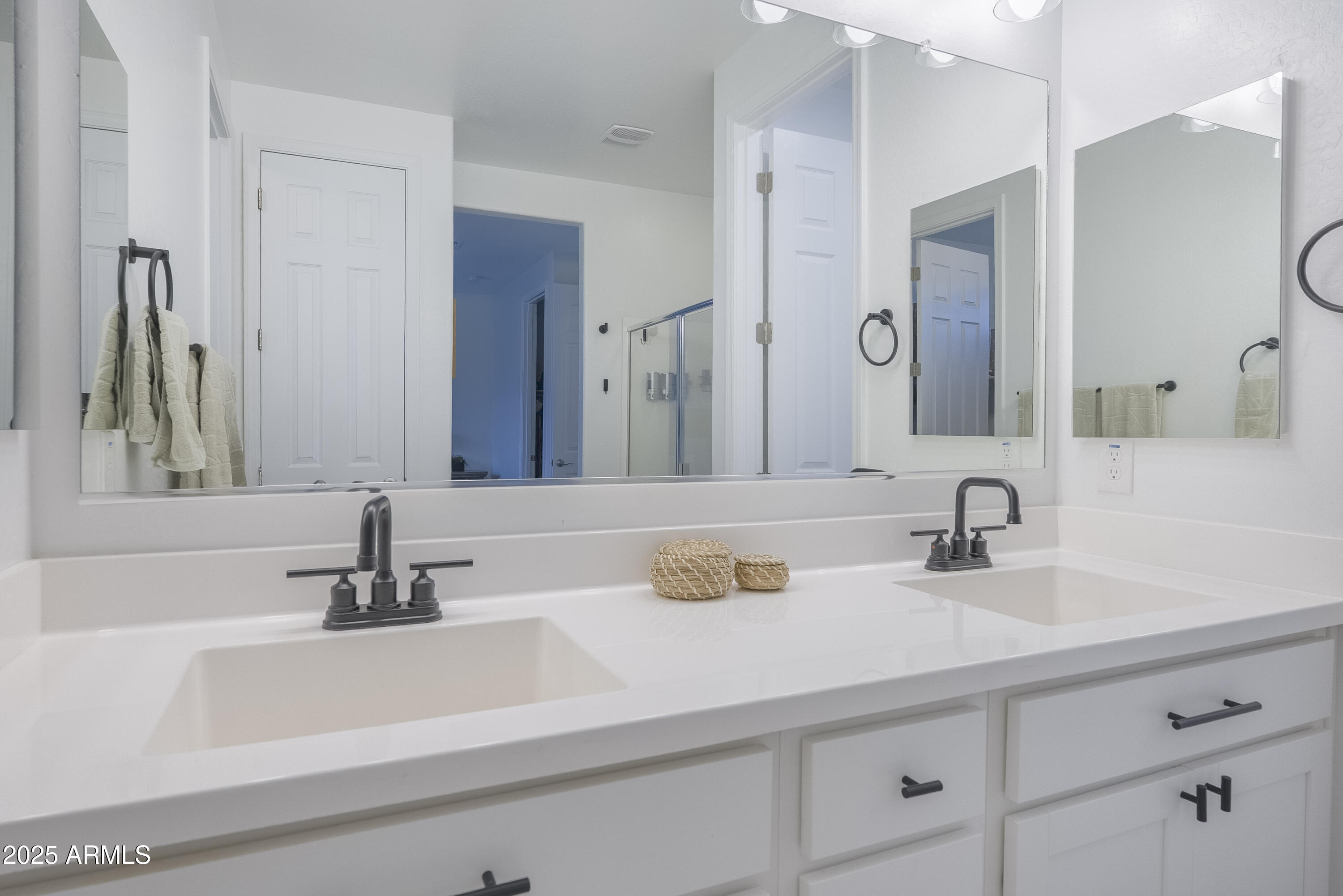 22638 East Quintero Court Queen Creek, AZ 85142 - Photo 21 of 39 a bathroom with a sink and a mirror