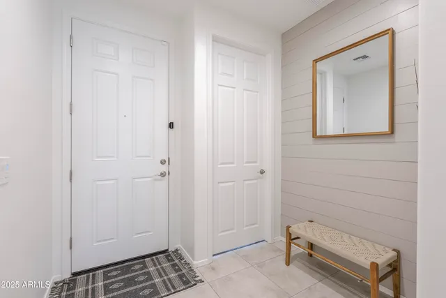 a view of room with window and wooden floor