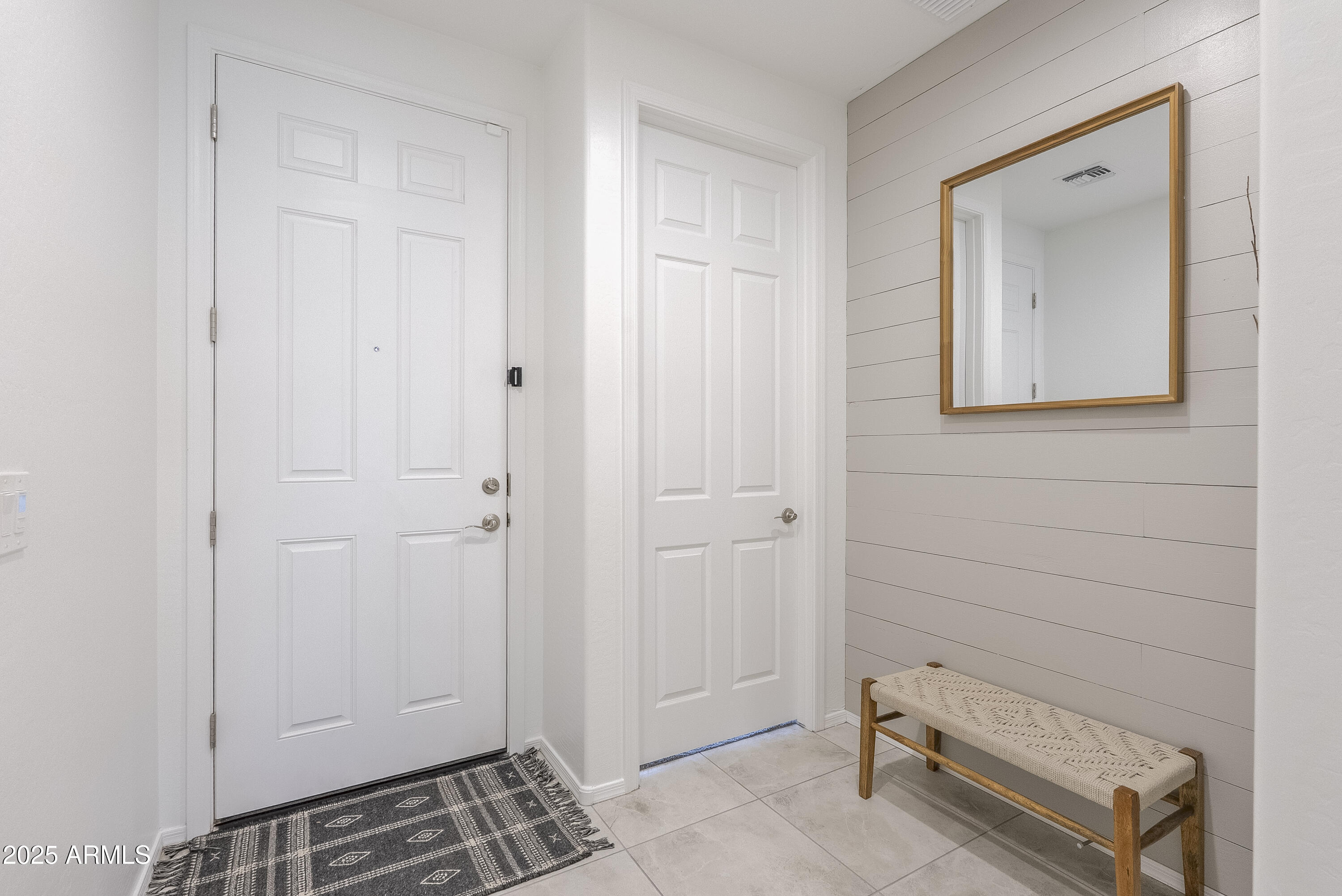22638 East Quintero Court Queen Creek, AZ 85142 - Photo 3 of 39 a view of room with window and wooden floor