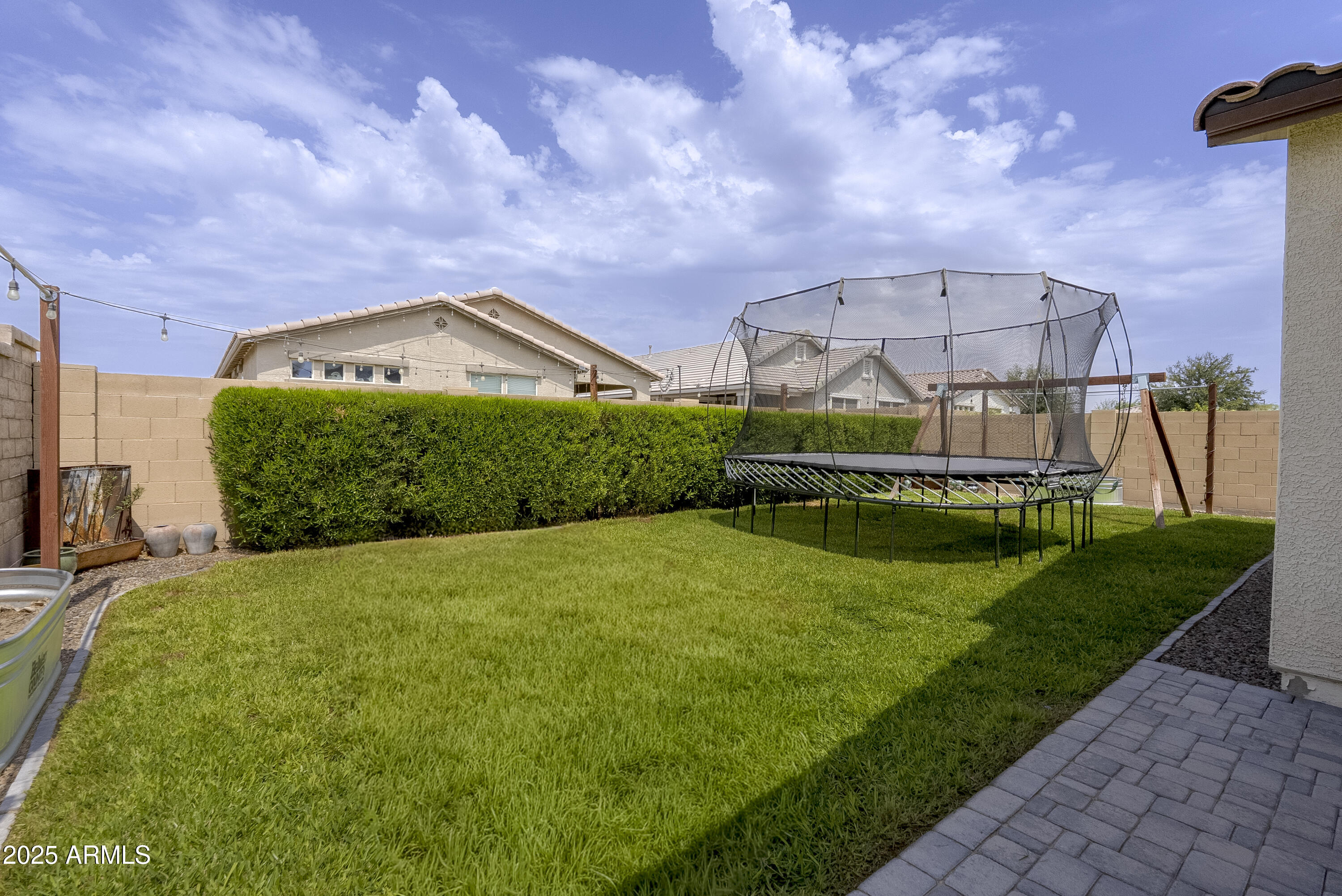 22638 East Quintero Court Queen Creek, AZ 85142 - Photo 37 of 39 a front view of a house with a yard