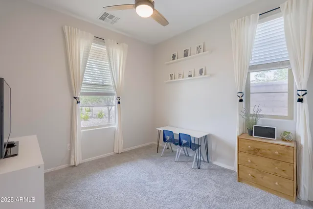 a room with furniture and a window