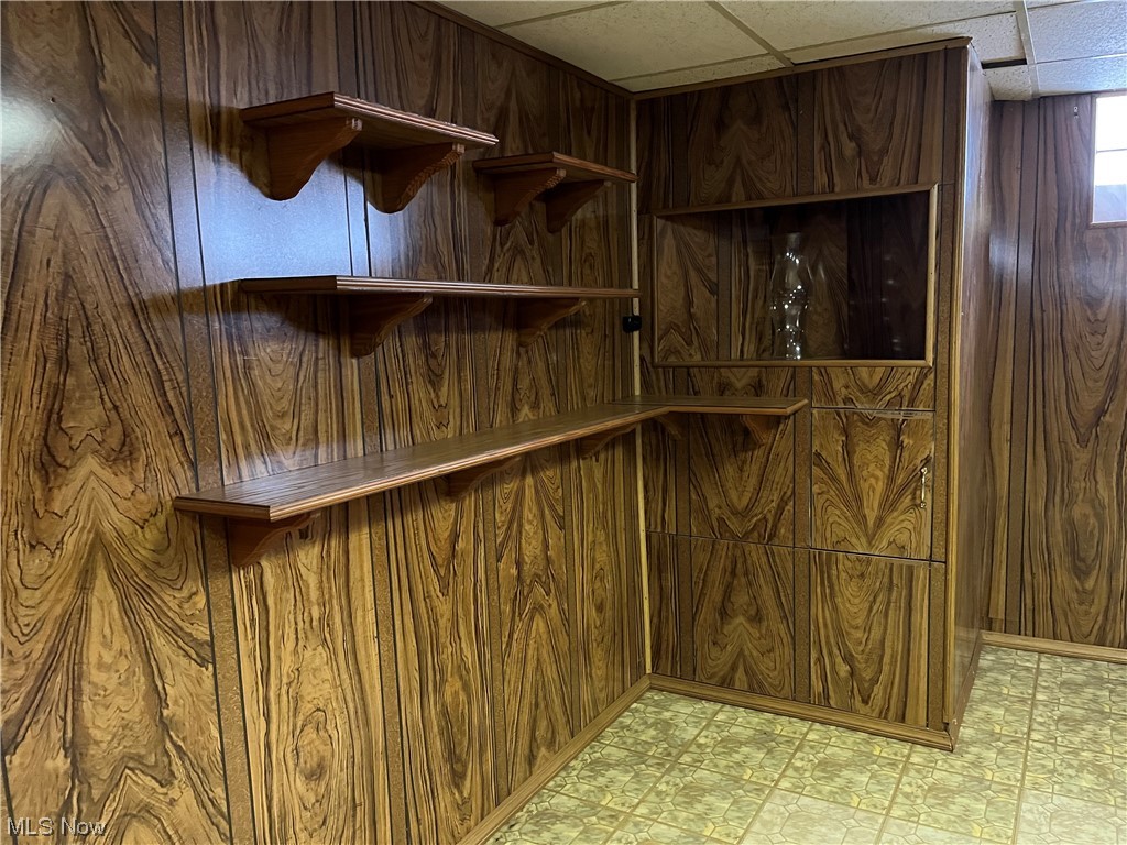 13101 Rockside Road Garfield Heights, OH 44125 - Photo 25 of 34 Paneled Rec Room with Shelves