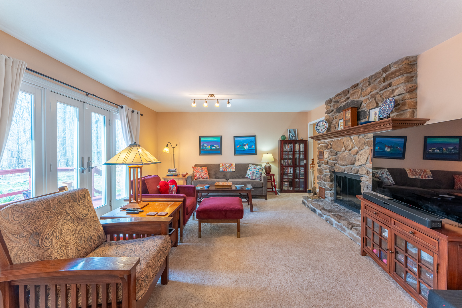 166 Union Grove Road Carbondale, IL 62903 - Photo 12 of 53 a living room with furniture a fireplace and a large window