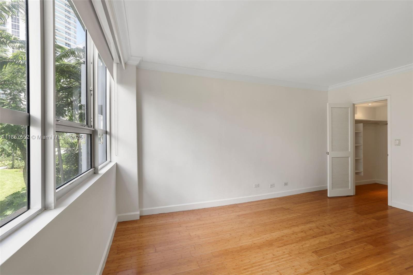 1500 Bay Road, Unit S0442 Miami Beach, FL 33139 - Photo 11 of 75 a view of an empty room and window