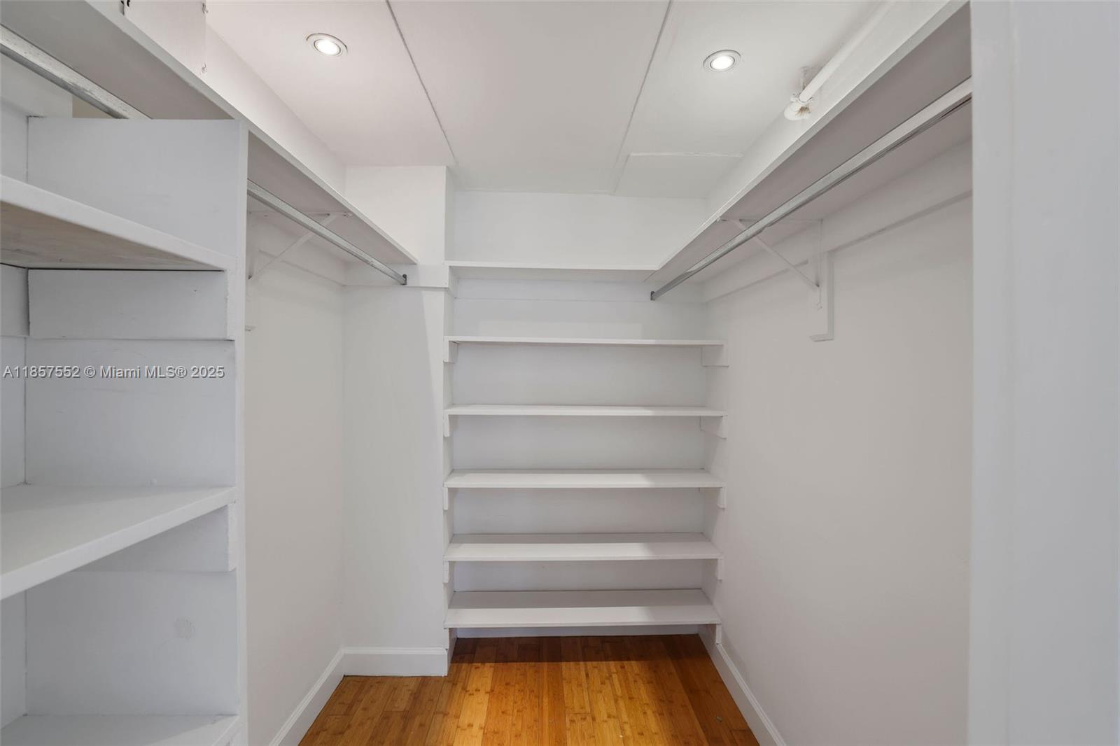 1500 Bay Road, Unit S0442 Miami Beach, FL 33139 - Photo 13 of 75 a view of walk in closet with empty racks