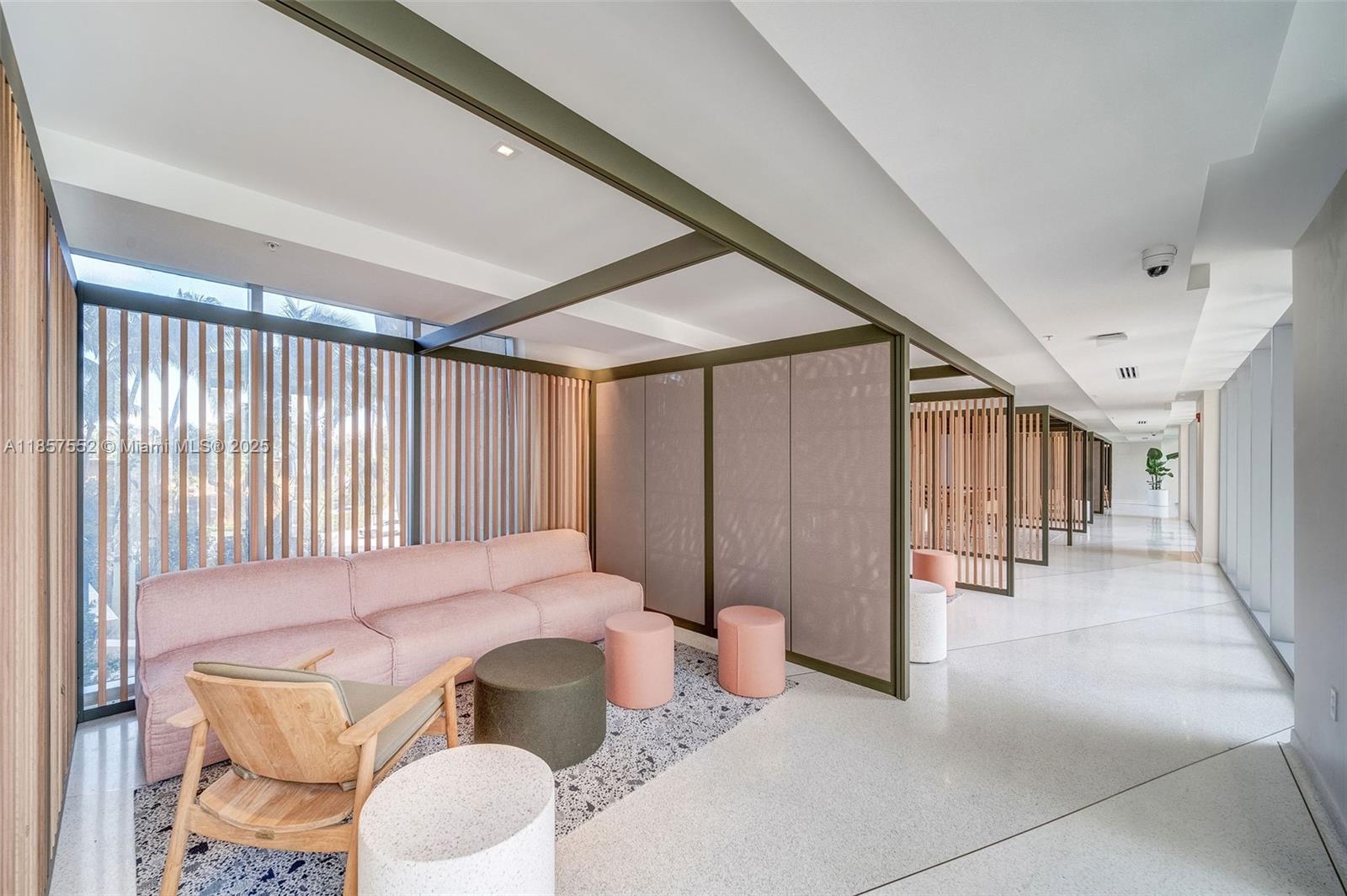 1500 Bay Road, Unit S0442 Miami Beach, FL 33139 - Photo 71 of 75 a spacious bedroom with a bed and a chandelier