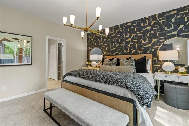 a spacious bathroom with a double vanity sink and mirror