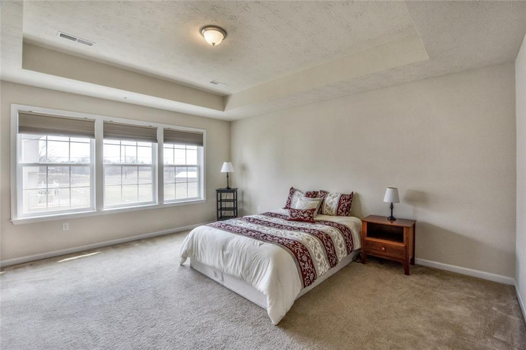 1 Truman Circle McKees Rocks, PA 15136 - Photo 15 of 25 Master bedroom with tray ceiling and walk-in closet