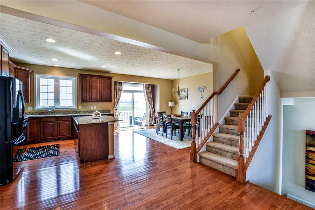 1 Truman Circle McKees Rocks, PA 15136 - Photo 5 of 25 Kitchen and dining area with a sliding glass door to the deck