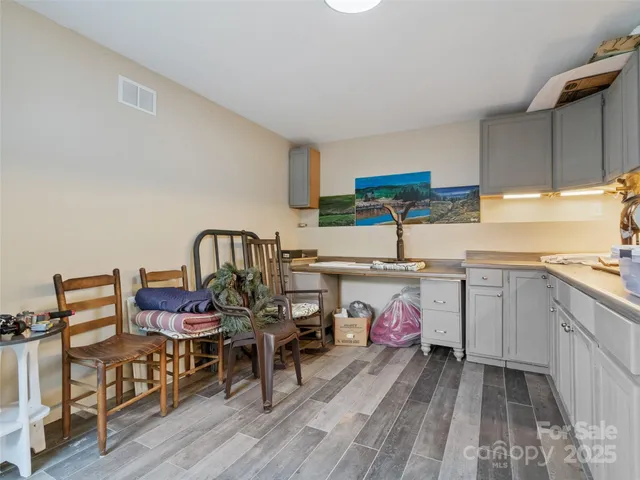 a view of a house with a yard and garage
