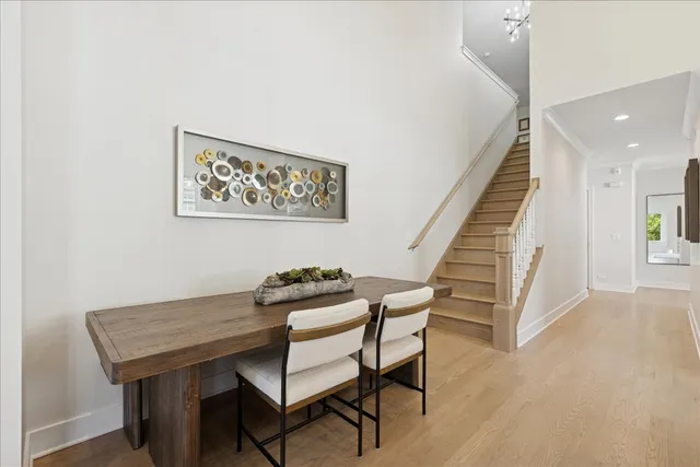 a view of a room with furniture and stairs
