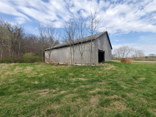 a backyard of a house with lots of green space