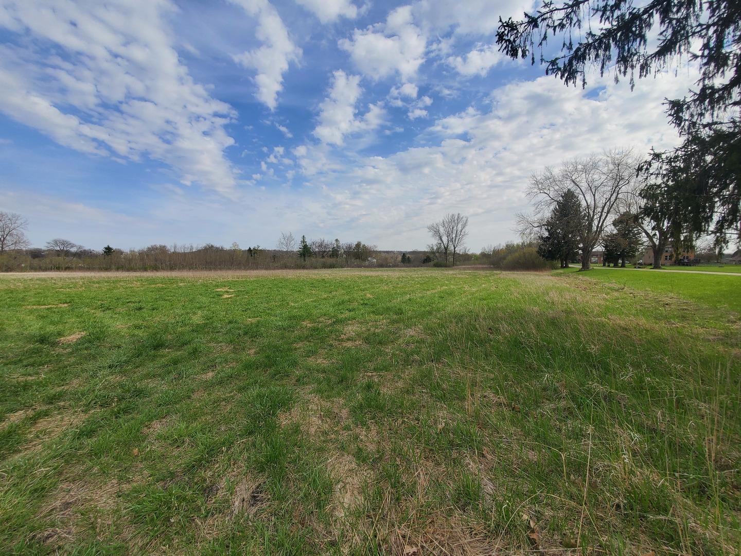 22738 1120th Avenue Princeton, IL 61356 - Photo 14 of 32 a view of a green field with wooden fence