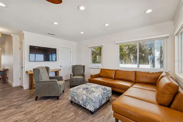 a bedroom with a bed and couch