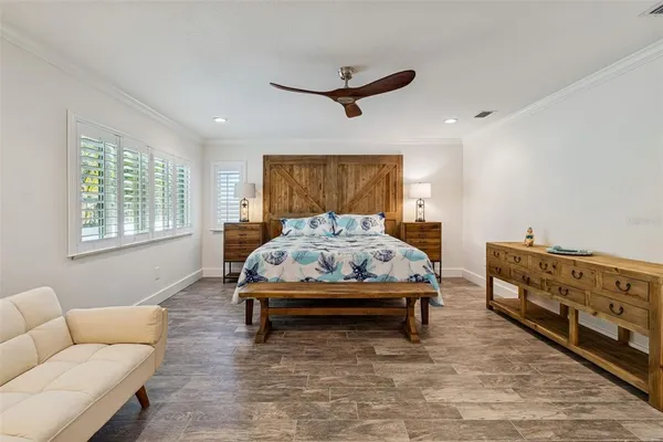 a bathroom with a granite countertop toilet sink and a shower
