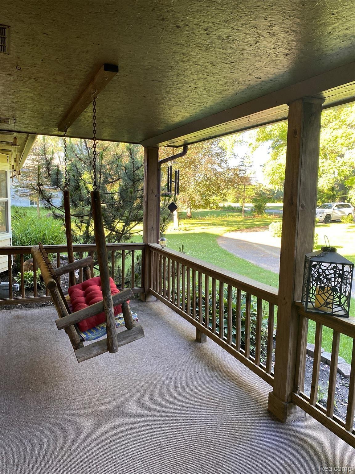 5850 Pine Knob Road Clarkston, MI 48346 - Photo 8 of 67 Porch swing.JPG