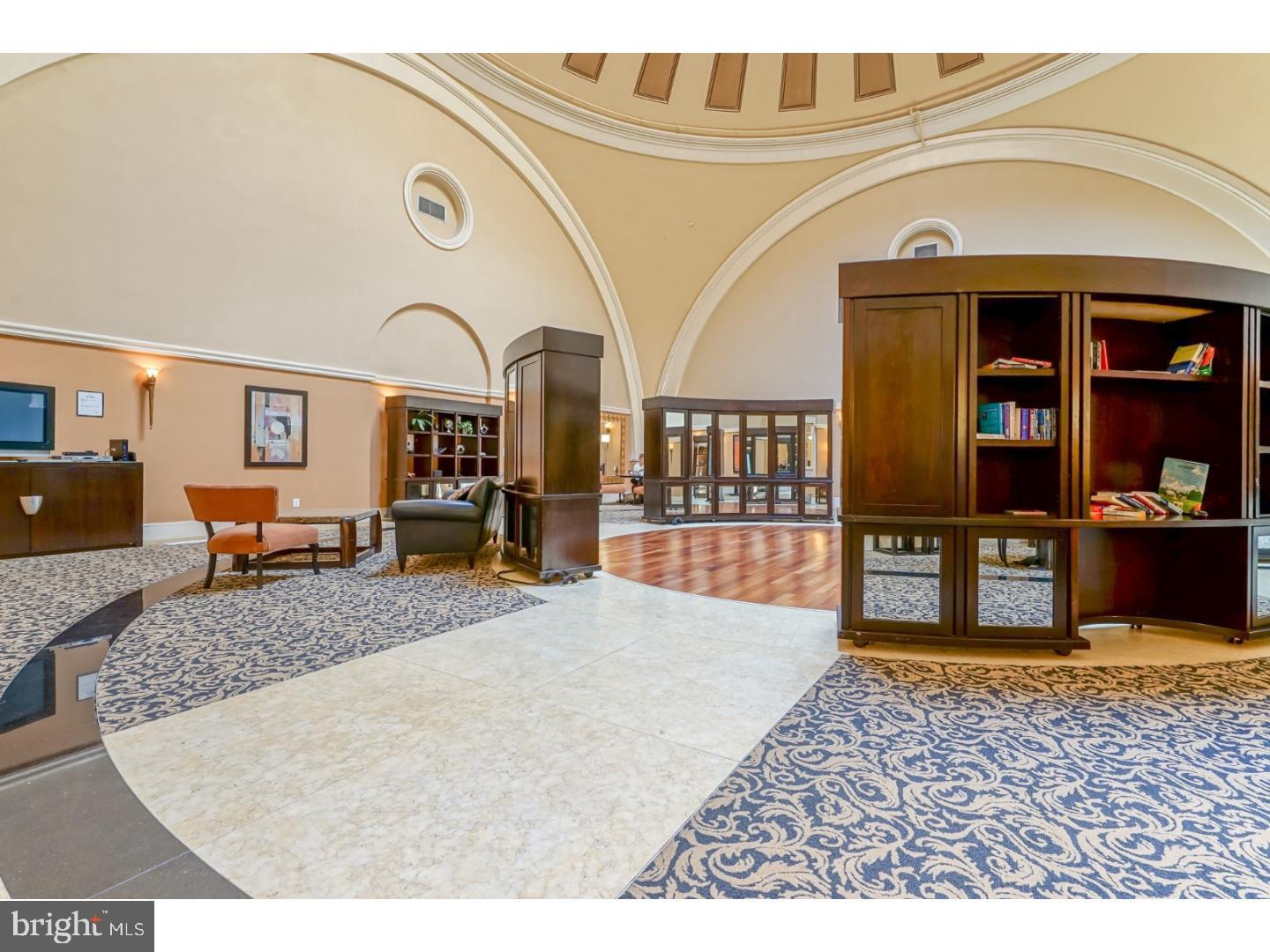 508 Captains Way Philadelphia, PA 19146 - Photo 24 of 25 a view of a livingroom with furniture and workspace