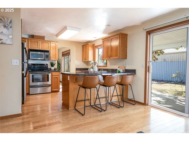 a view of a dining room kitchen and a window