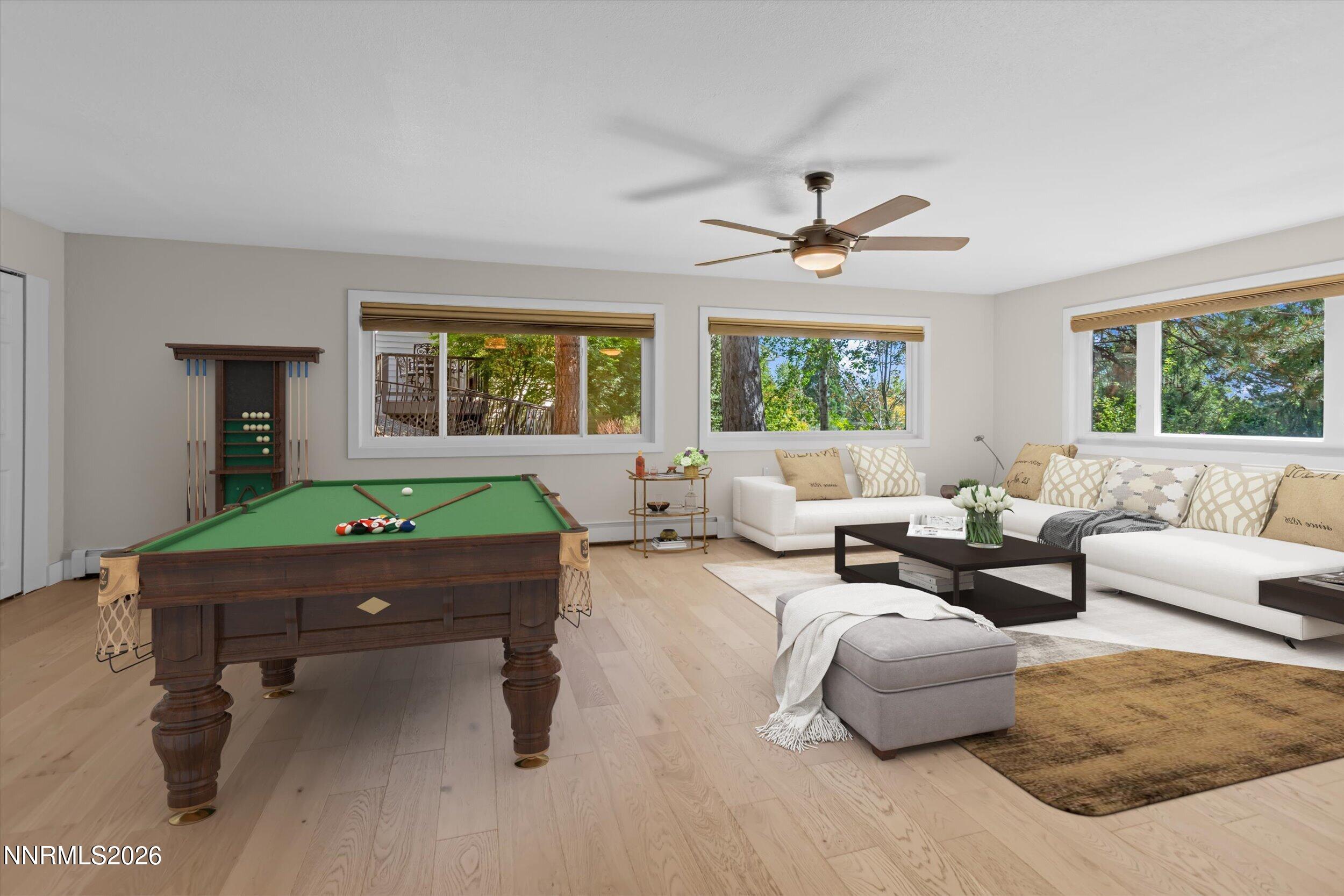 2725 West Lake Ridge Shores Reno, NV 89519 - Photo 19 of 49 a living room with furniture and windows