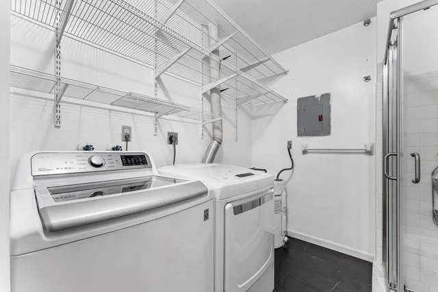 a view of a backyard with wooden fence