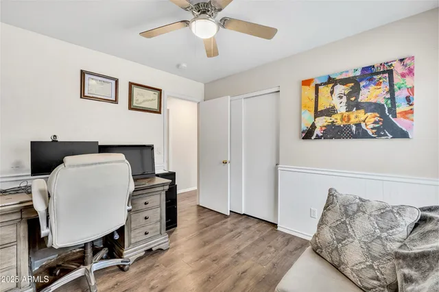a workspace with furniture and wooden floor
