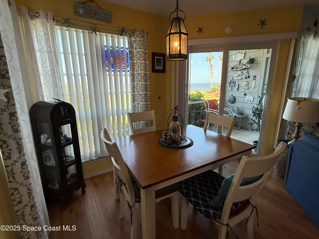 a kitchen with stainless steel appliances granite countertop a refrigerator stove and sink