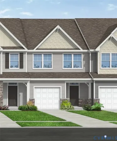 a front view of a house with a garden and plants