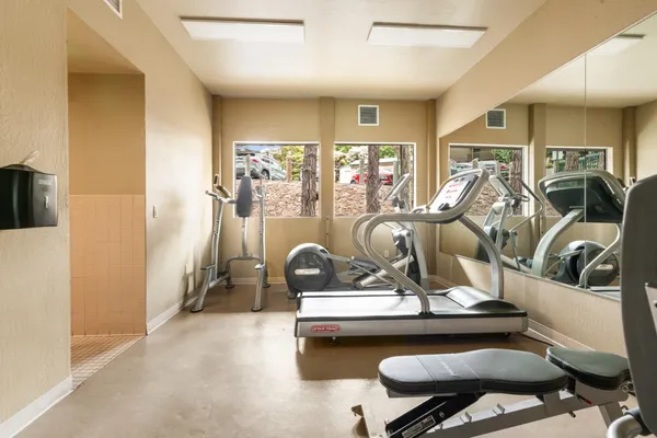 a view of a room with gym equipment