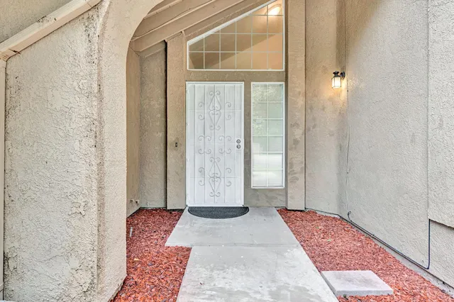 a view of front door with a glass door