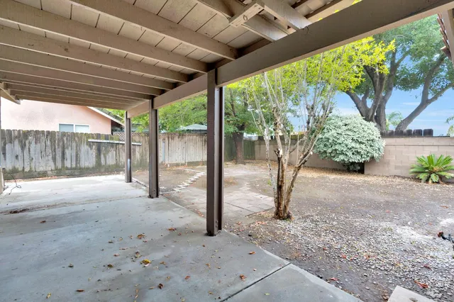 a view of backyard with green space