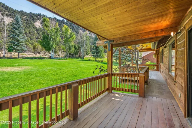 a view of porch with wooden floor and outdoor space