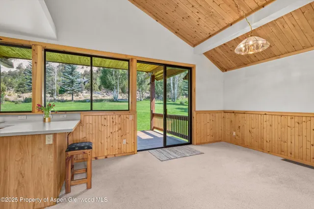 an empty room with sliding door