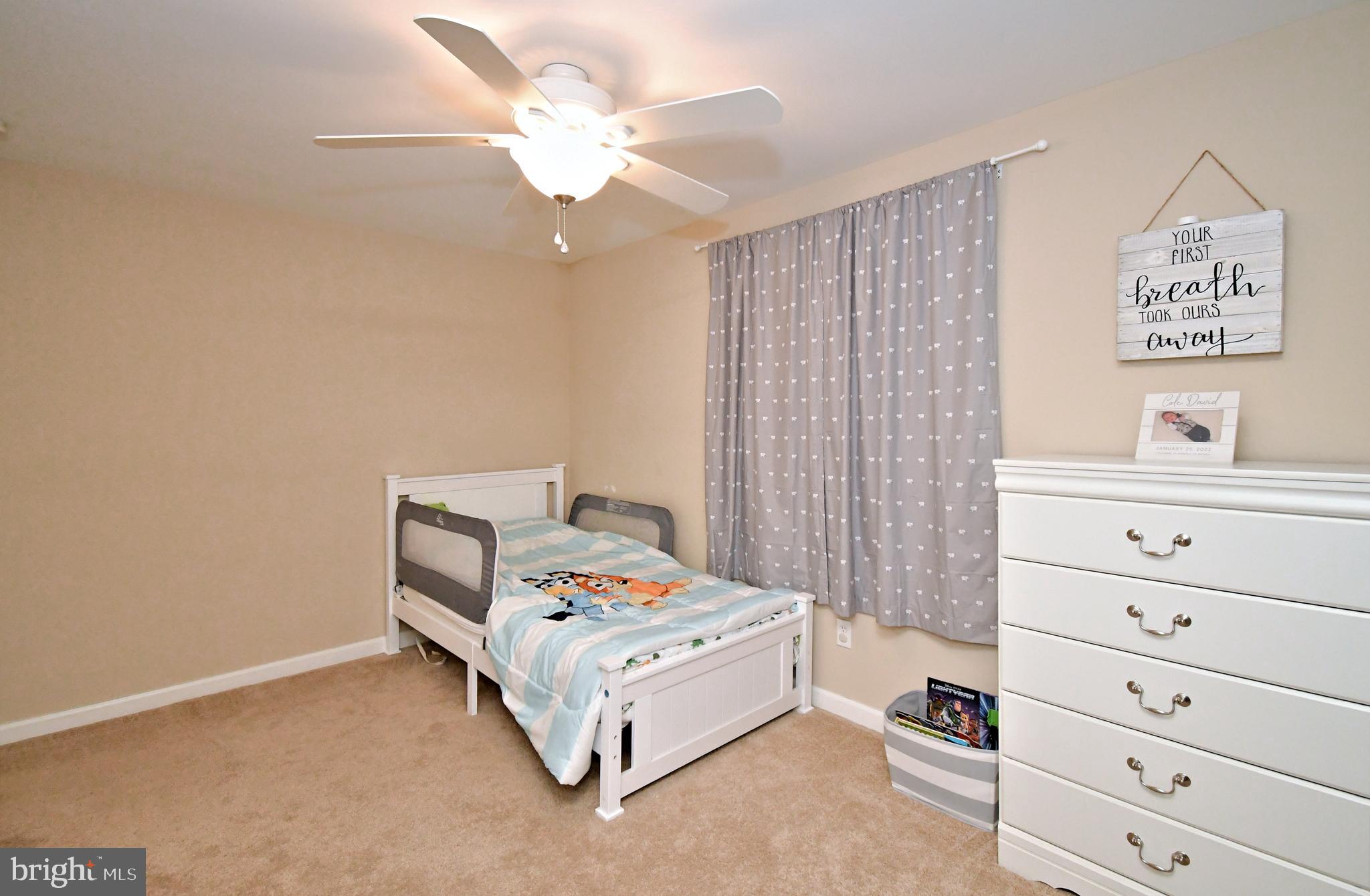 701 Cypress Road Warminster, PA 18974 - Photo 27 of 52 a bed room with a bed and a dresser