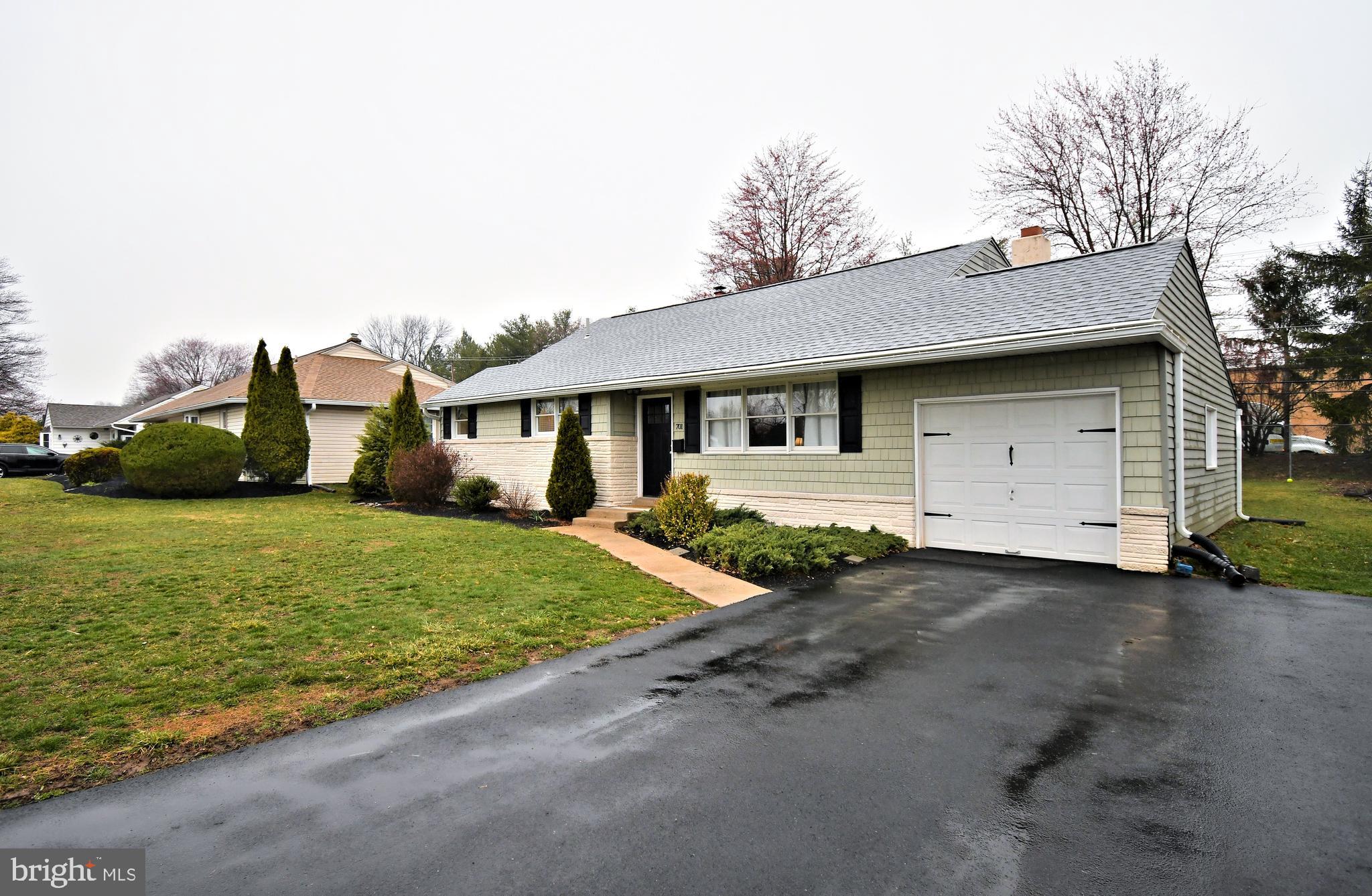 701 Cypress Road Warminster, PA 18974 - Photo 3 of 52 a front view of a house with a yard