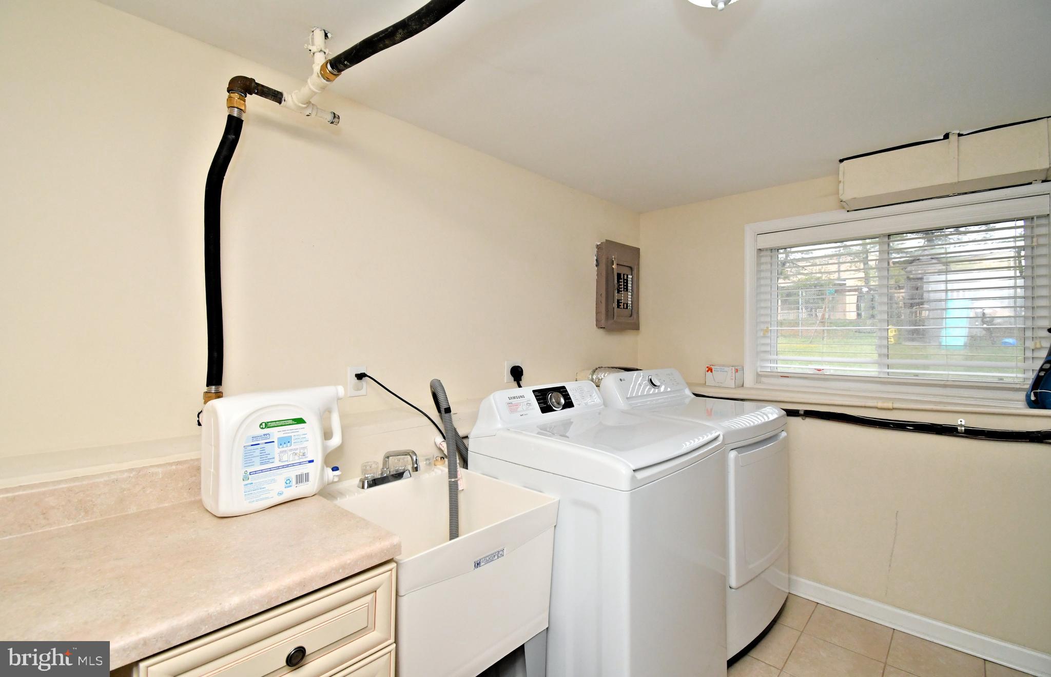701 Cypress Road Warminster, PA 18974 - Photo 40 of 52 a utility room with dryer and washer