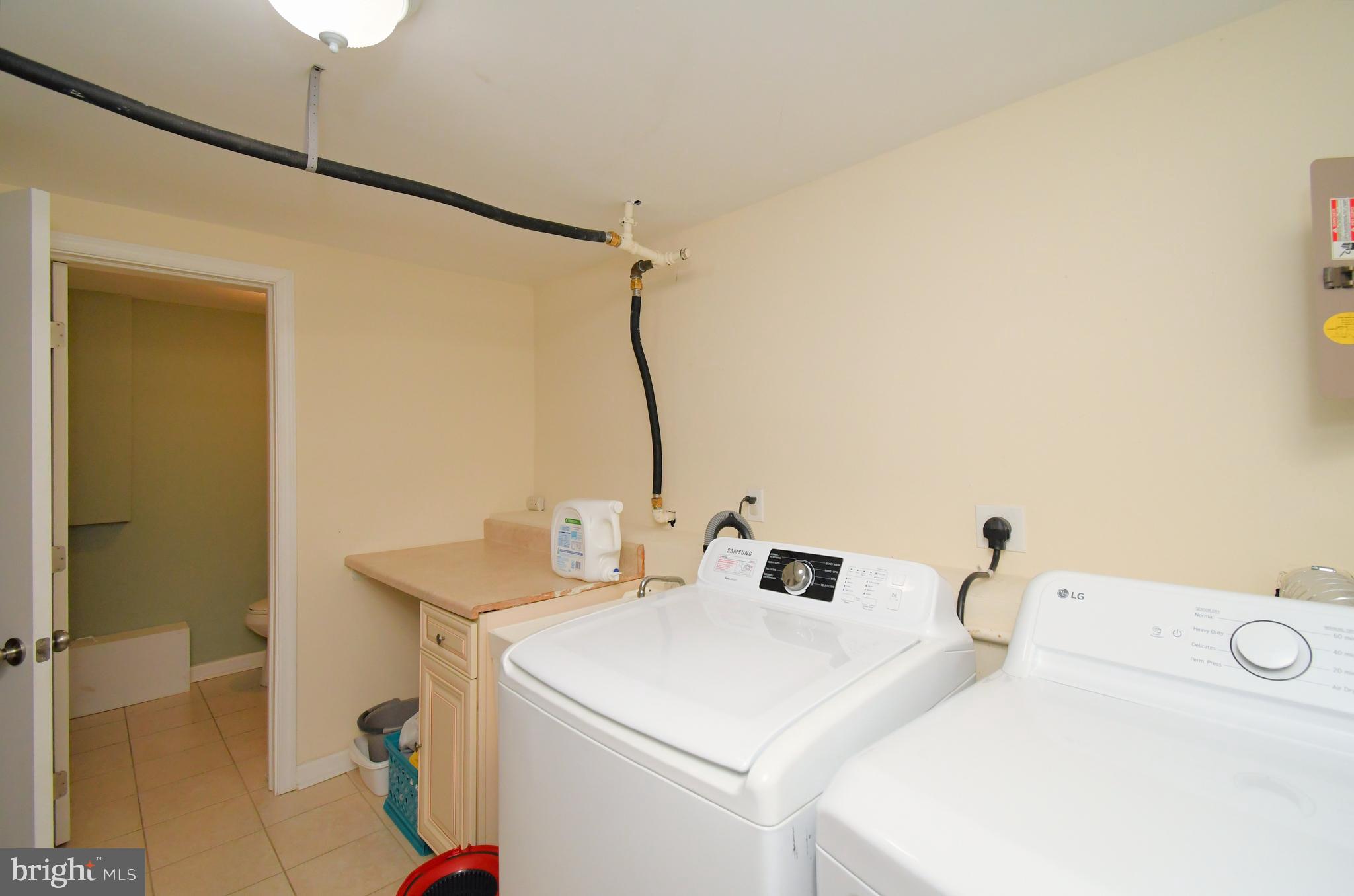 701 Cypress Road Warminster, PA 18974 - Photo 41 of 52 a bathroom with a sink and a mirror