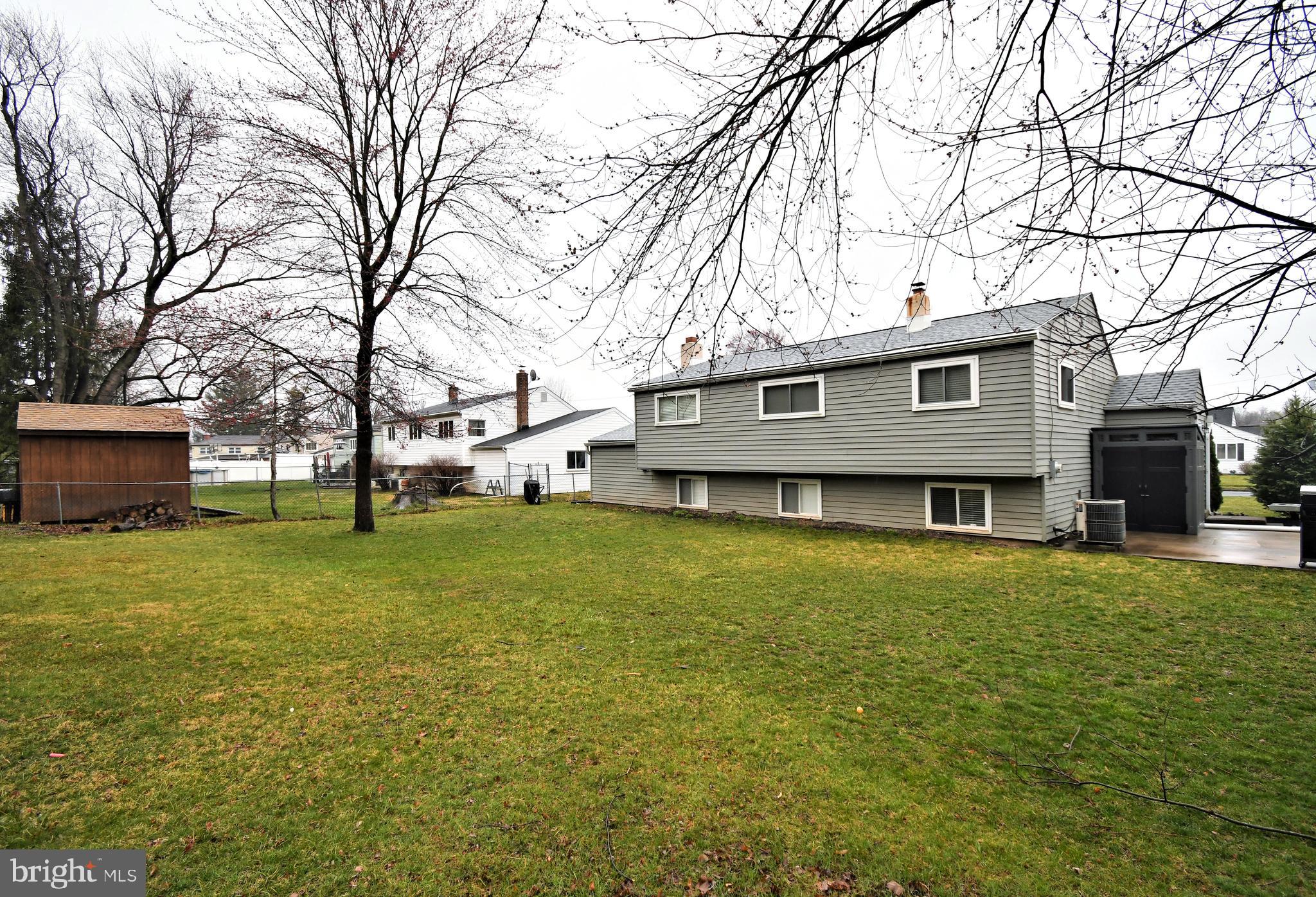 701 Cypress Road Warminster, PA 18974 - Photo 50 of 52 a view of a house with a big yard