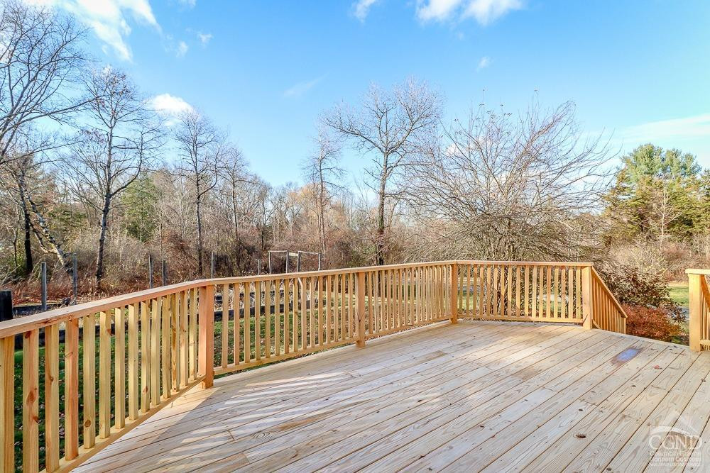 149 Spring Road Hudson, NY 12534 - Photo 20 of 30 a view of balcony with wooden floor and fence