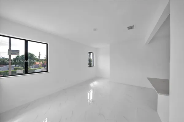 an empty room with a window