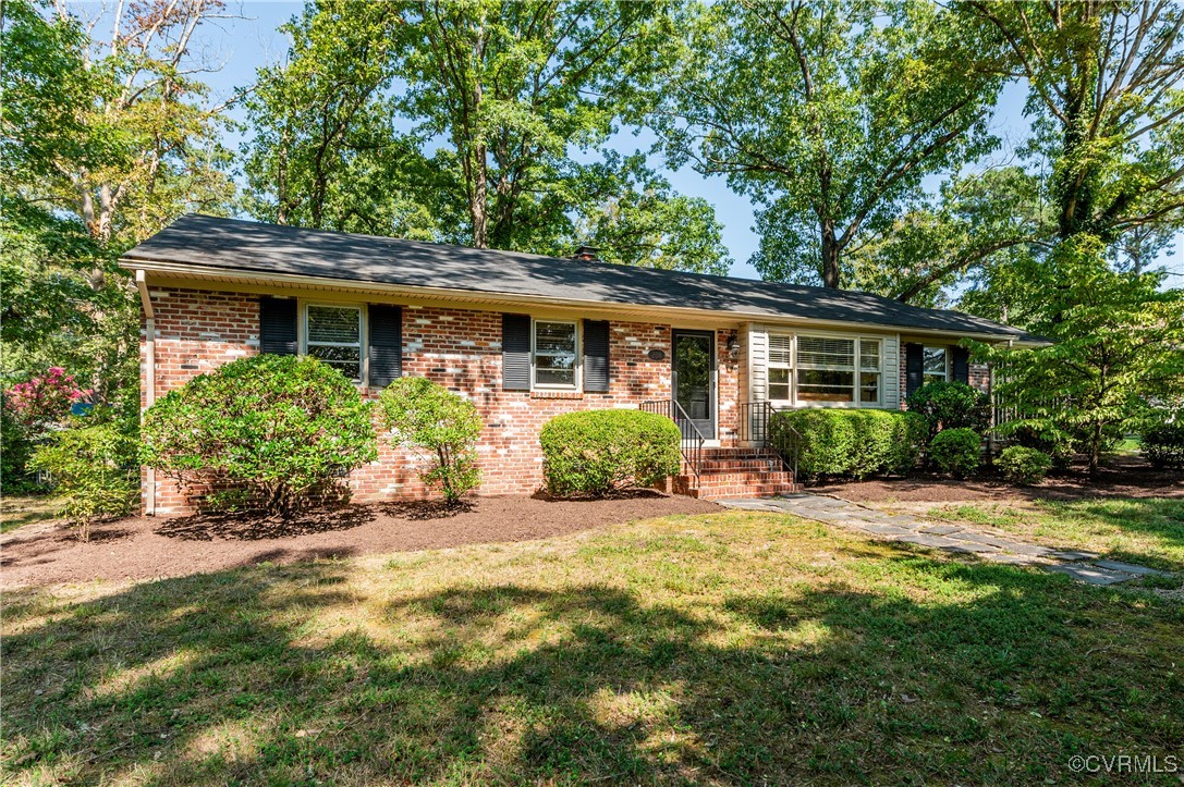 208 Tamarack Road Henrico, VA 23229 - Photo 2 of 35 front view of a house with a patio